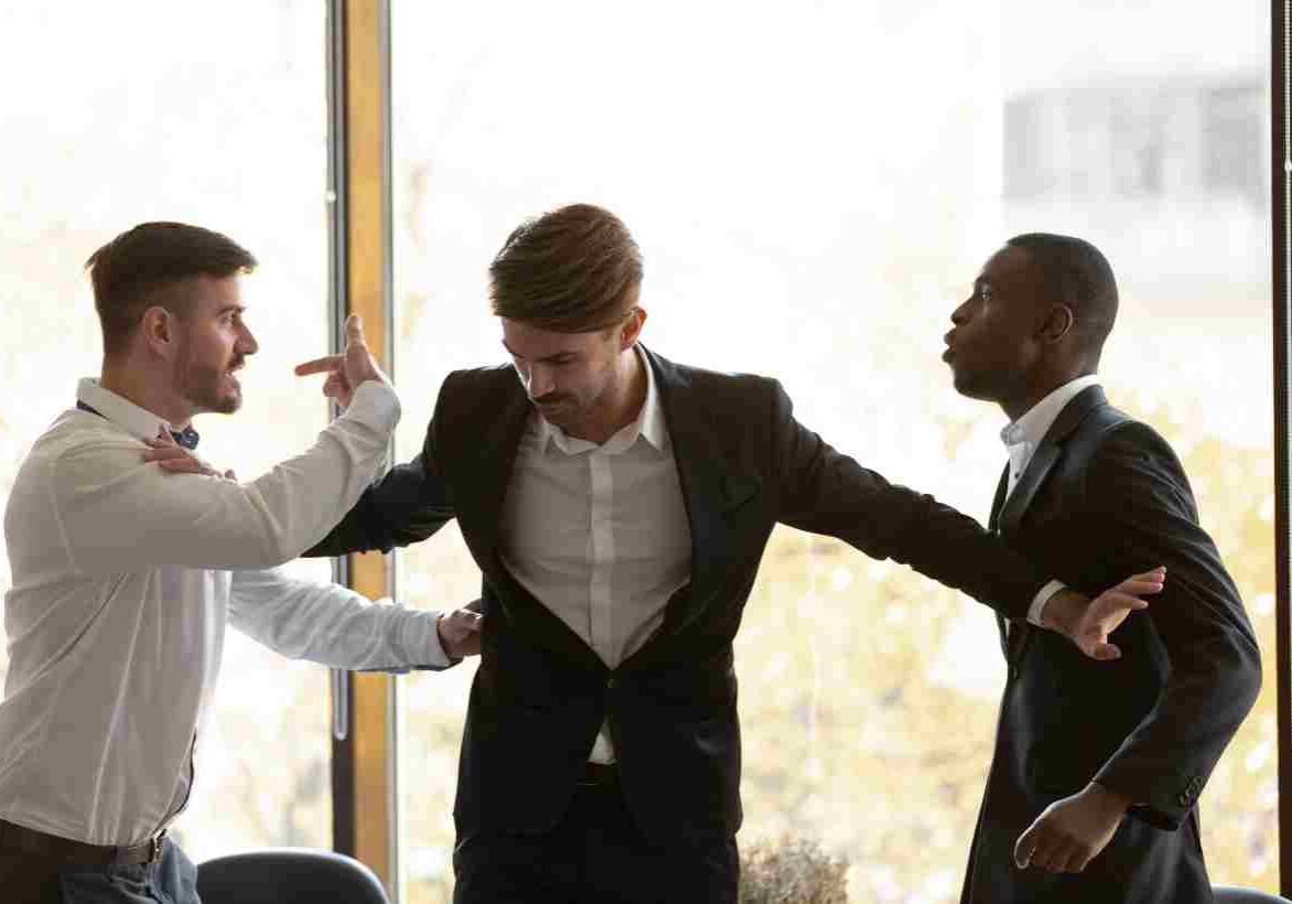 fight being broken up between business men